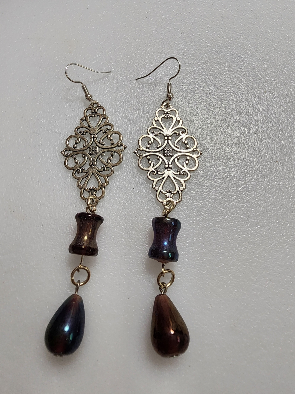 Elegant Filigree Drop Earrings with Iridescent Brown Glass Beads
